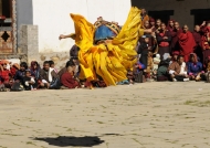 1 monk jumping (back view)